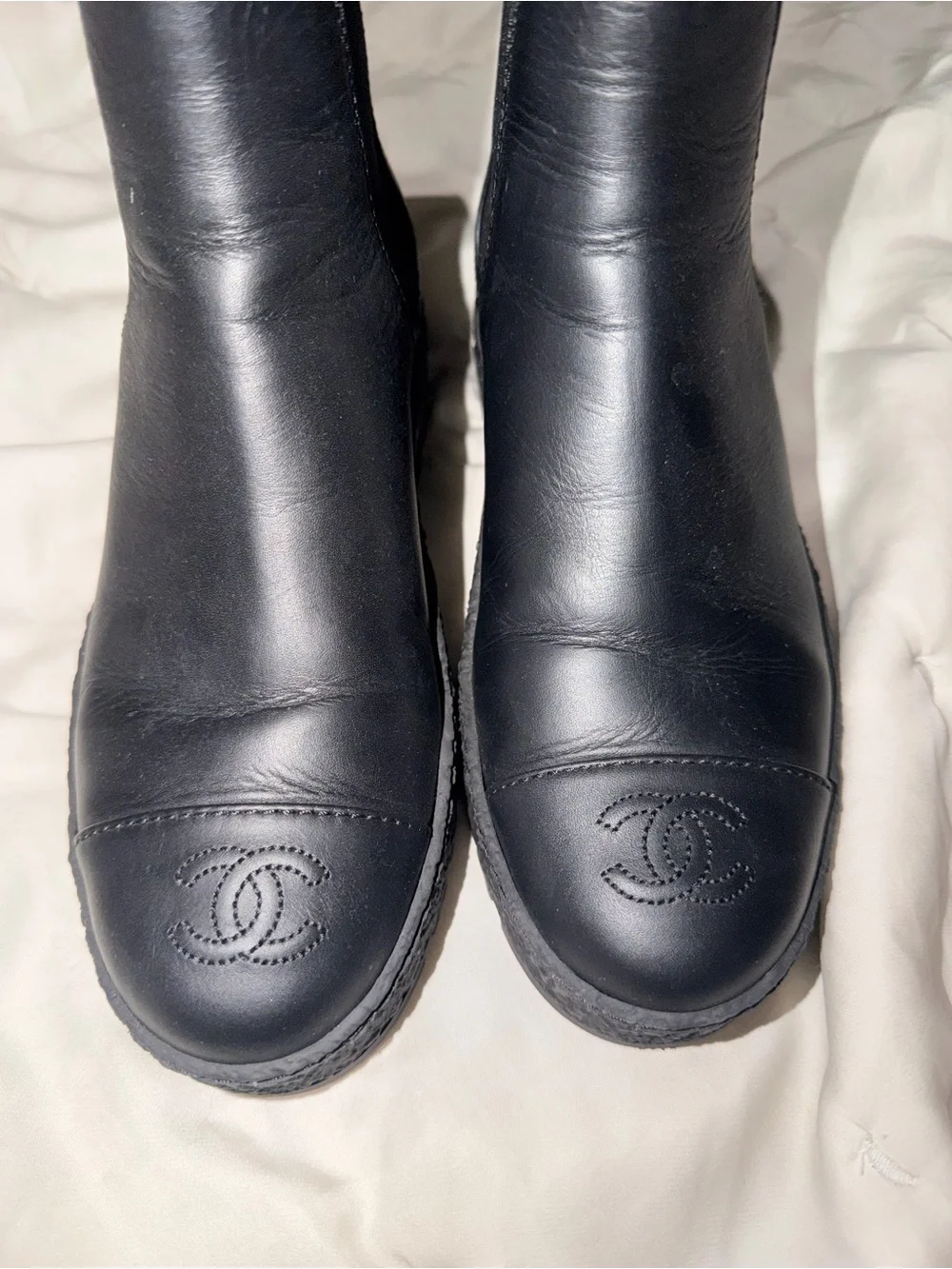 CHANEL Black Leather Platform Chelsea Booties with Gold CC Accent rubber sole